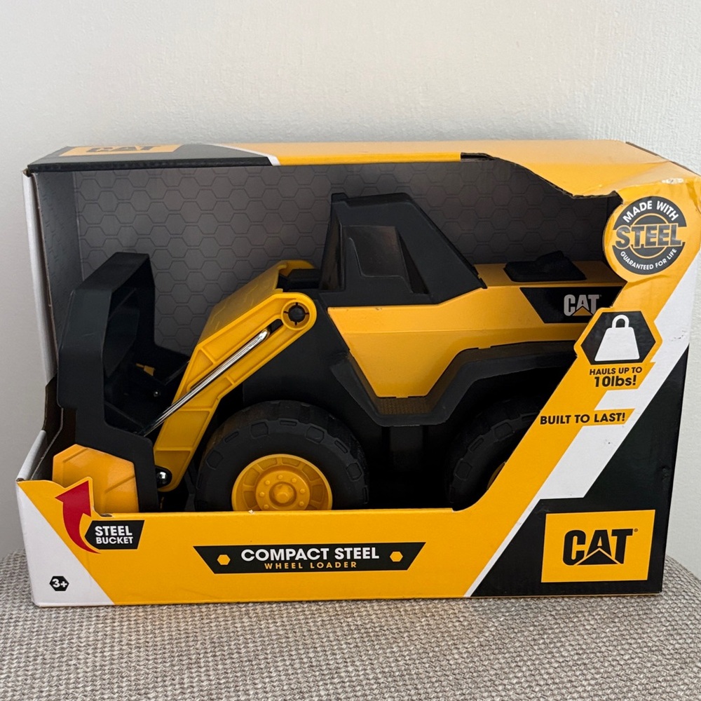 Caterpillar Yellow and Black Steel Wheel Loader